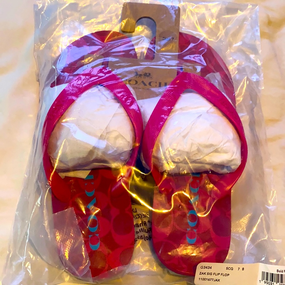 Coach flipflop , in Bold pink color . Size 7